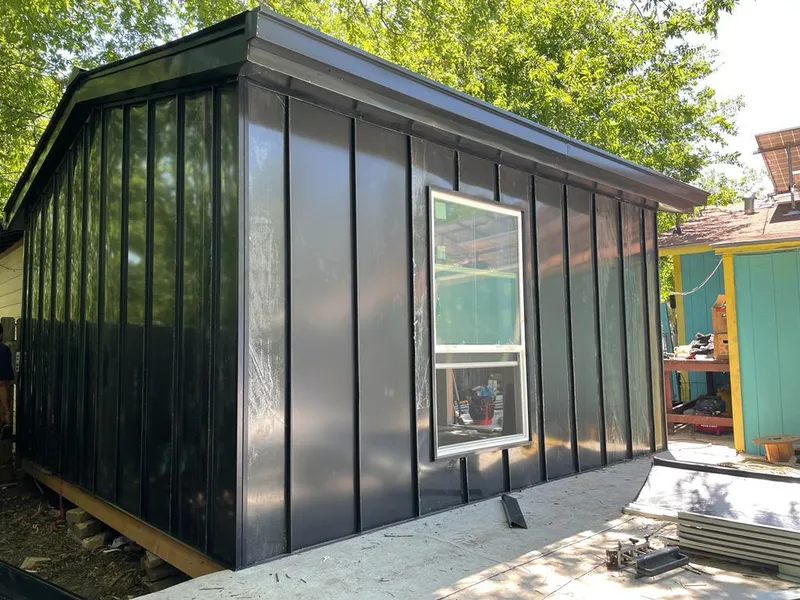 Black standing seam metal wall panels for Metal Roof Installation in Westport